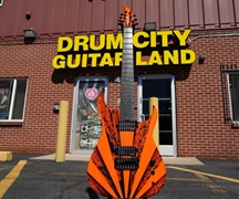 Schecter USA CUSTOM SHOP  KM-7 Keith Merrow - Neon Orange/Black Rays 7-String Electric Guitar 